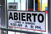 Picture of business opening hours sign in Ciudad Obregon